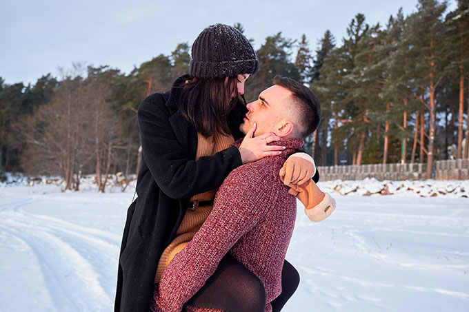 Couple in a winter mountain atmosphere